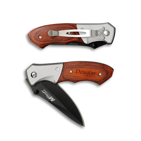 Two folding knives with wooden handles on a white background